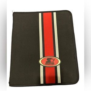 Starter red and black trapper keeper with folders inside